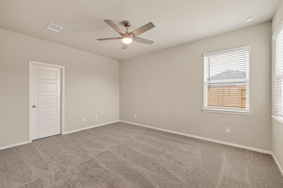 Spacious, unfurnished interior of a new home in Sunterra, Katy (Image 37).
