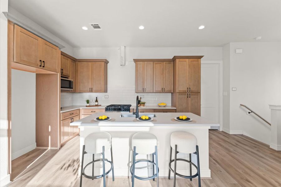 Representative furnished interior of a home built from the Plan 1458 by Faircroft Homes in Highland Gardens, Houston (Image 19).