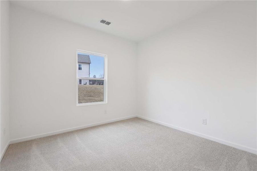 Spacious, unfurnished interior of a new home in The Pointe at Heron Bay, Locust Grove (Image 24).