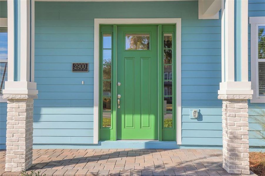 Exterior details and patio area of a home in Weslyn Park at Sunbridge (Craft Homes), St. Cloud (Image 19).
