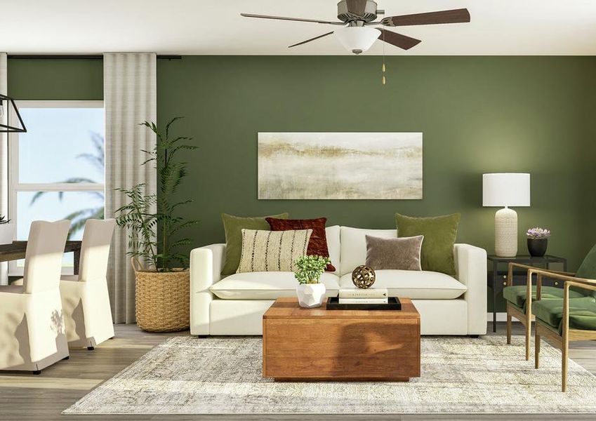 Rendering of the living area showcasing a
  sofa, accent chairs, and tables along a green accent wall and a view of the
  dining area to the left.