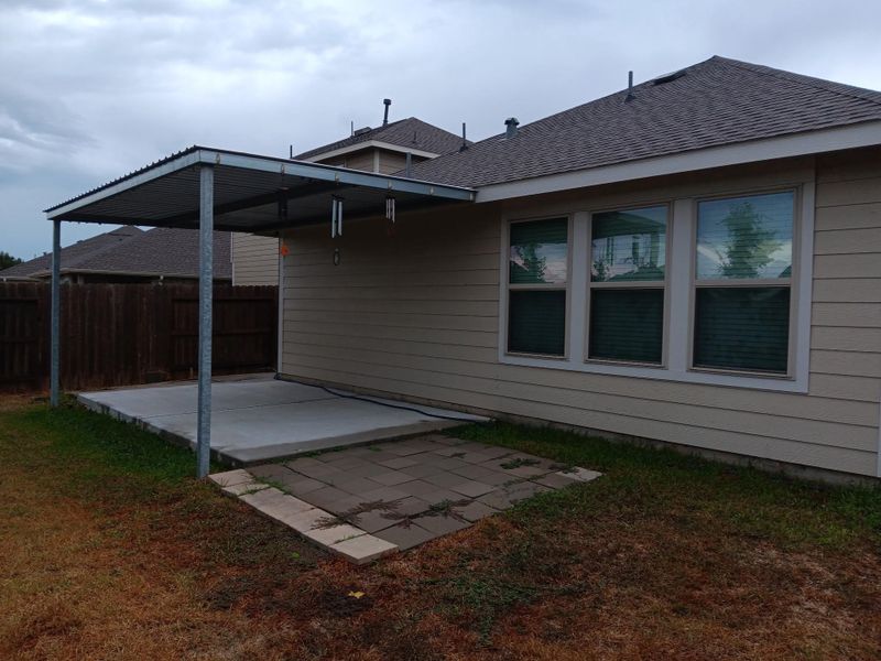 Exterior details and patio area of a home in Tavola: Gulf Coast Collection, New Caney (Image 2).