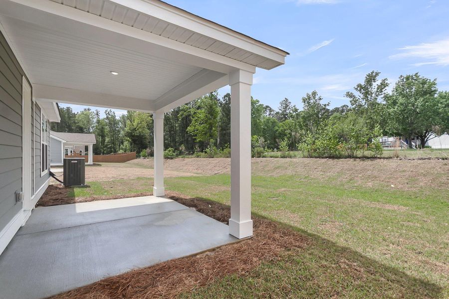 Front exterior of a new home in Sweetgrass Station, Summerville, SC, highlighting curb appeal (Image 18).
