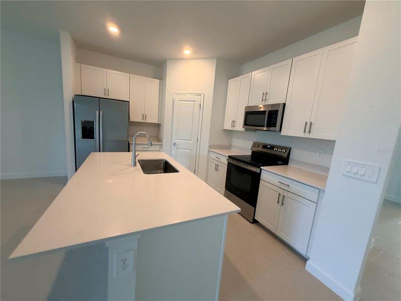 Furnished interior view inside a new home in Island Lakes at Coco Bay, Englewood (Image 5).