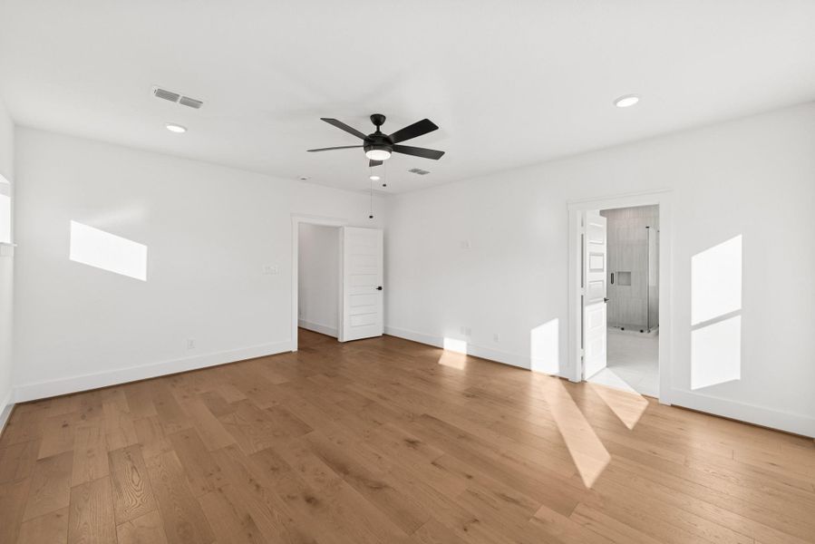 Spacious, unfurnished interior of a new home in Easthaven at Bridgeland Central - Vision Collection, Cypress (Image 28). Spacious, unfurnished interior of a new home in Easthaven at Bridgeland Central - Vision Collection, Cypress (Image 28).