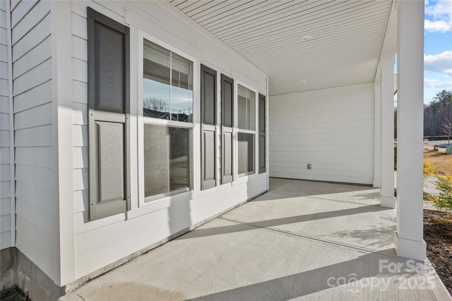 Exterior details and patio area of a home in Forest Creek, Waxhaw (Image 27).