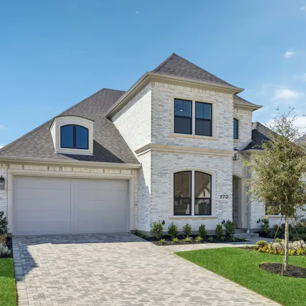 Front exterior of a new home in StarView, Prosper, TX, highlighting curb appeal (Image 26).