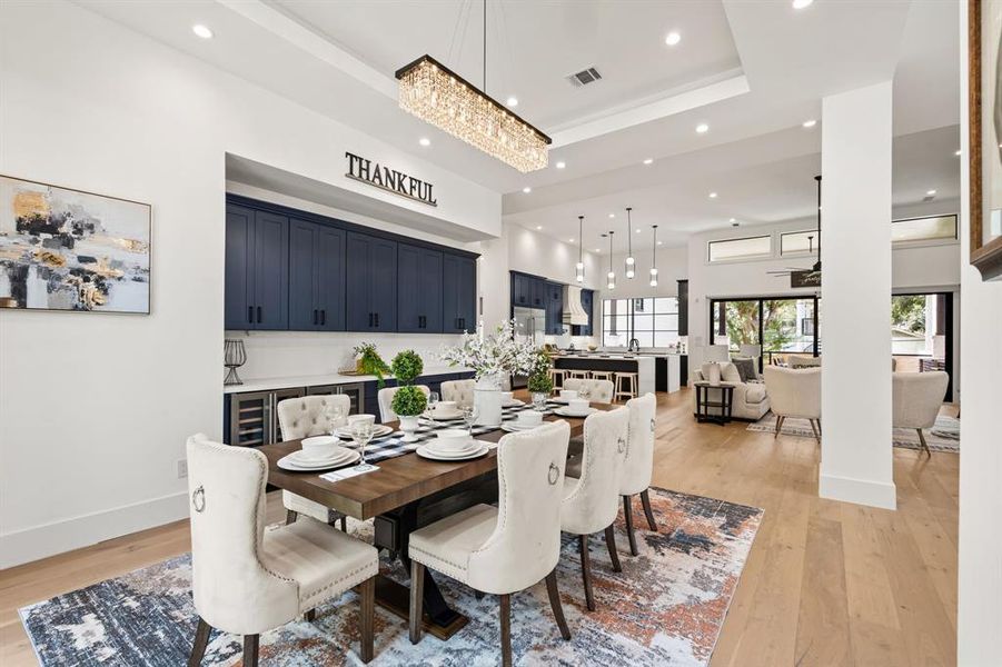 An additional view of the Dedicated Dining Area open to the Luxurious Living Room and Gourmet Kitchen, making entertaining a breeze.