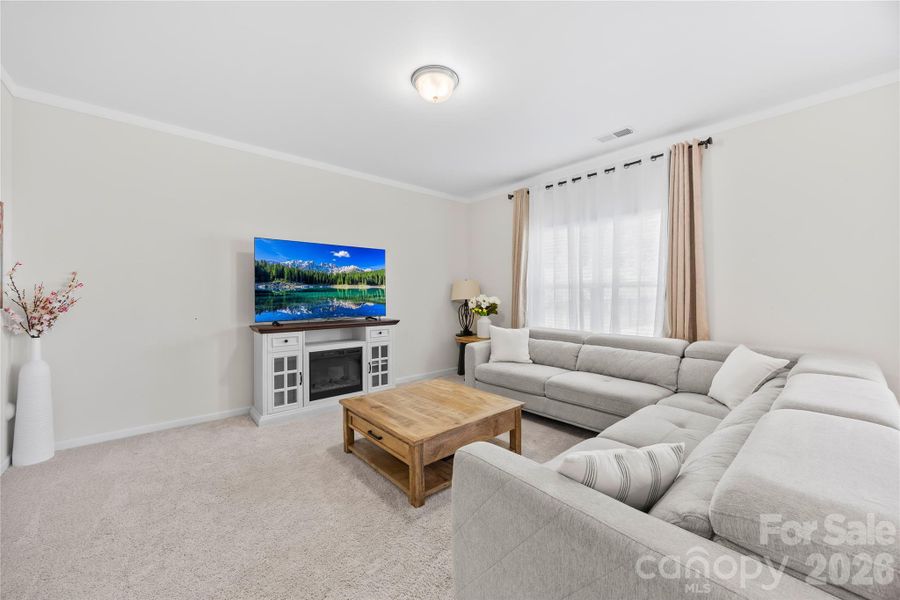 Furnished interior view inside a new home in Orchard Creek, Charlotte (Image 13).