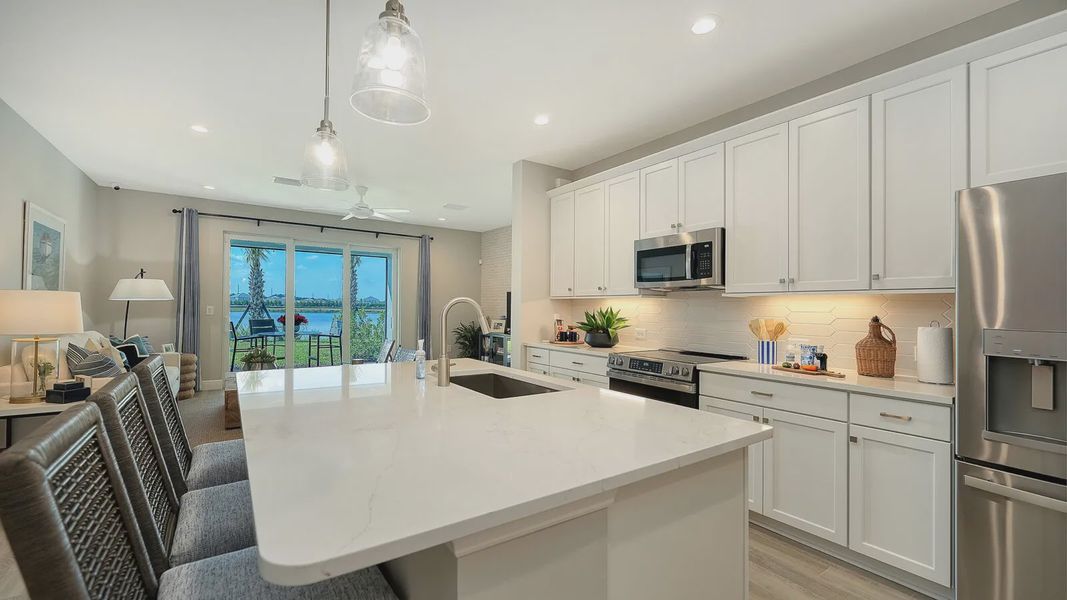 Representative furnished interior of a home built from the Avery by Neal Communities in SkySail, Naples (Image 24).