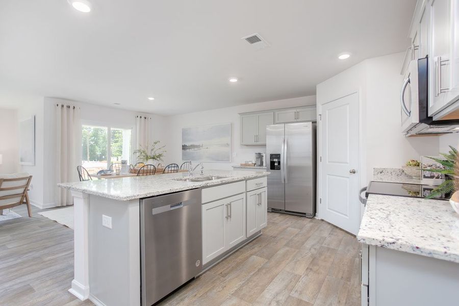 Representative furnished interior of a home built from the CALI by D.R. Horton in Edinborough, Gibsonville (Image 6). Representative furnished interior of a home built from the CALI by D.R. Horton in Edinborough, Gibsonville (Image 6).