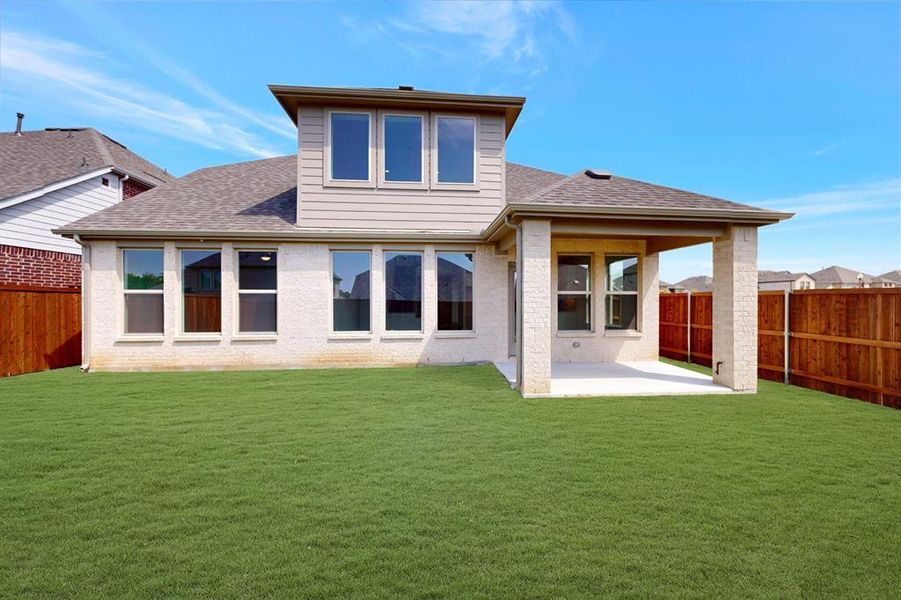Front exterior of a new home in Vintage Village, Argyle, TX, highlighting curb appeal (Image 1). Front exterior of a new home in Vintage Village, Argyle, TX, highlighting curb appeal (Image 1).