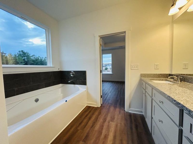 Furnished interior view inside a new home in Sutton's Landing, Statham (Image 10).