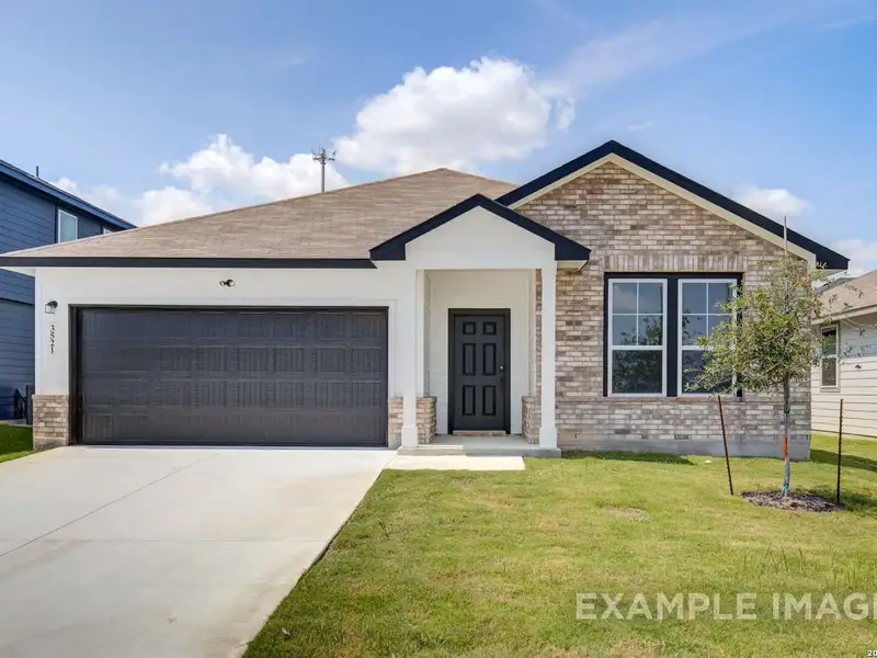 Front exterior of a new home in Comanche Ridge, San Antonio, TX, highlighting curb appeal (Image 2). Front exterior of a new home in Comanche Ridge, San Antonio, TX, highlighting curb appeal (Image 2).