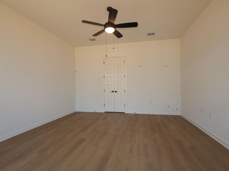 Spacious, unfurnished interior of a new home in Estancia West, Manchaca (Image 6). Spacious, unfurnished interior of a new home in Estancia West, Manchaca (Image 6).