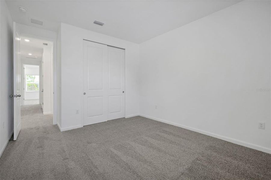 Spacious, unfurnished interior of a new home in Serenade at Ovation, Winter Garden (Image 27). Spacious, unfurnished interior of a new home in Serenade at Ovation, Winter Garden (Image 27).