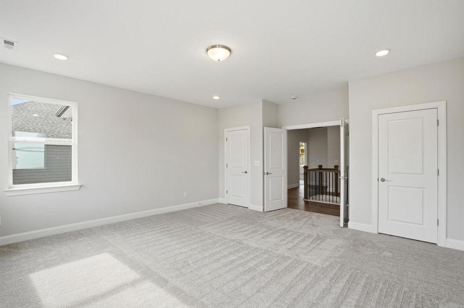 Spacious, unfurnished interior of a new home in Carrington, Stanley (Image 64).
