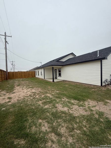 Exterior details and patio area of a home in , Beeville (Image 14).