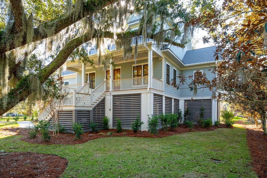 Exterior details and patio area of a home in , Johns Island (Image 32).
