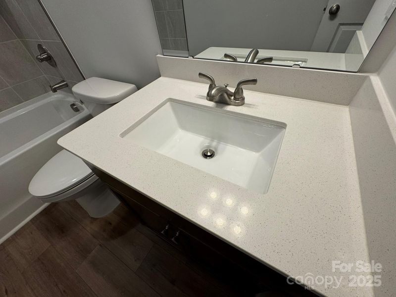 Quartz countertop at hall bath
