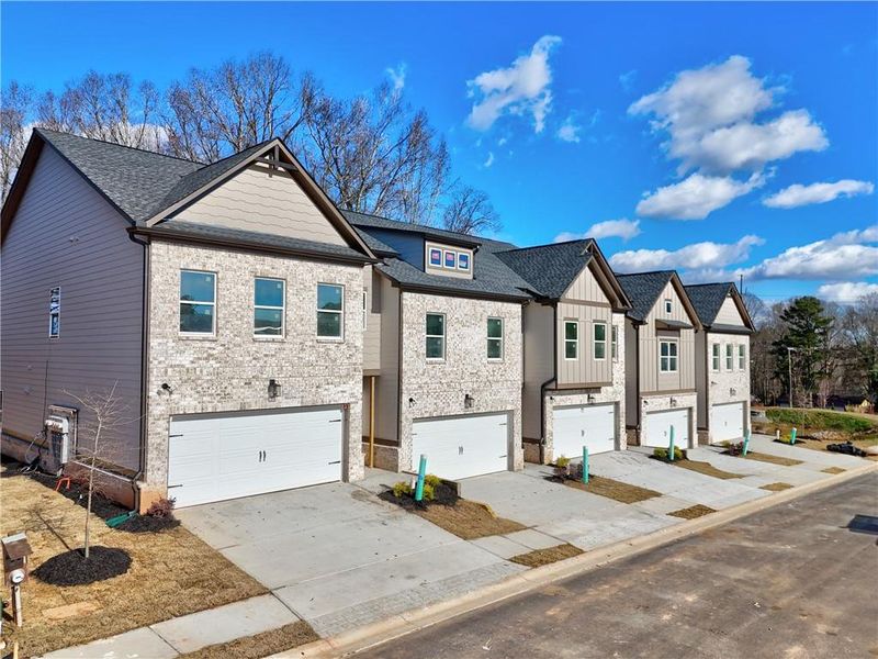 Front exterior of a new home in , Norcross, GA, highlighting curb appeal (Image 4).