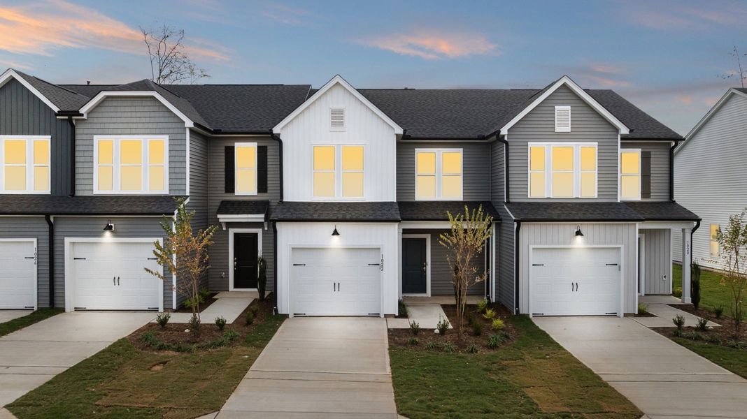 Front exterior of a new home in Poets Walk, Whitsett, NC, highlighting curb appeal (Image 2).