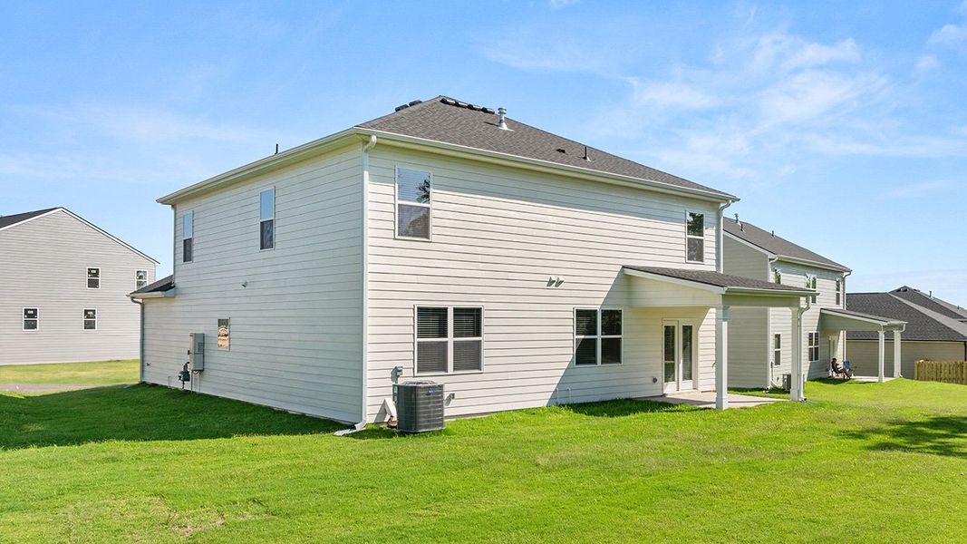 Exterior details and patio area of a home in Estates at Deer Hollow, Grovetown (Image 26).