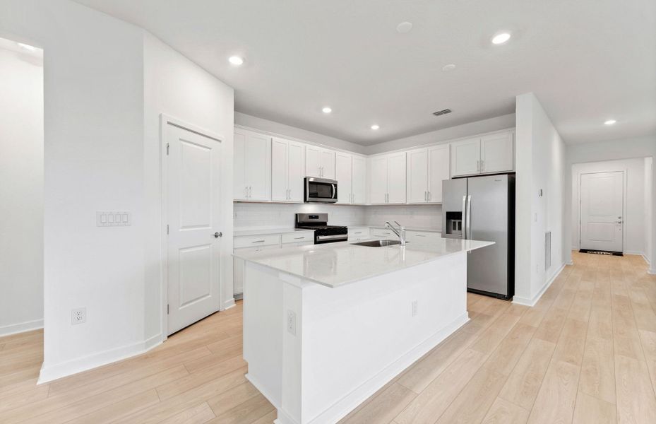 Furnished interior view inside a new home in Riversong, Parrish (Image 12).