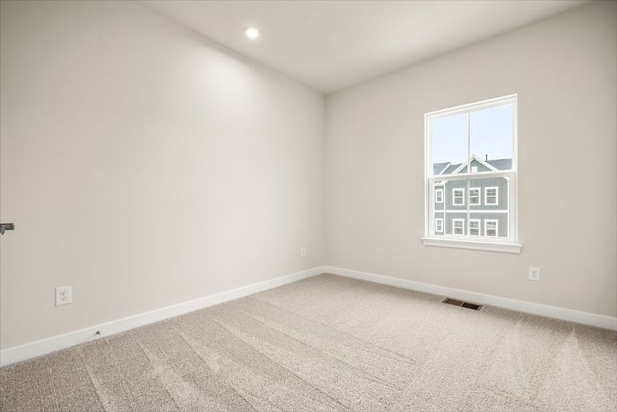 Spacious, unfurnished interior of a new home in Townes at The Station, Apex (Image 22).