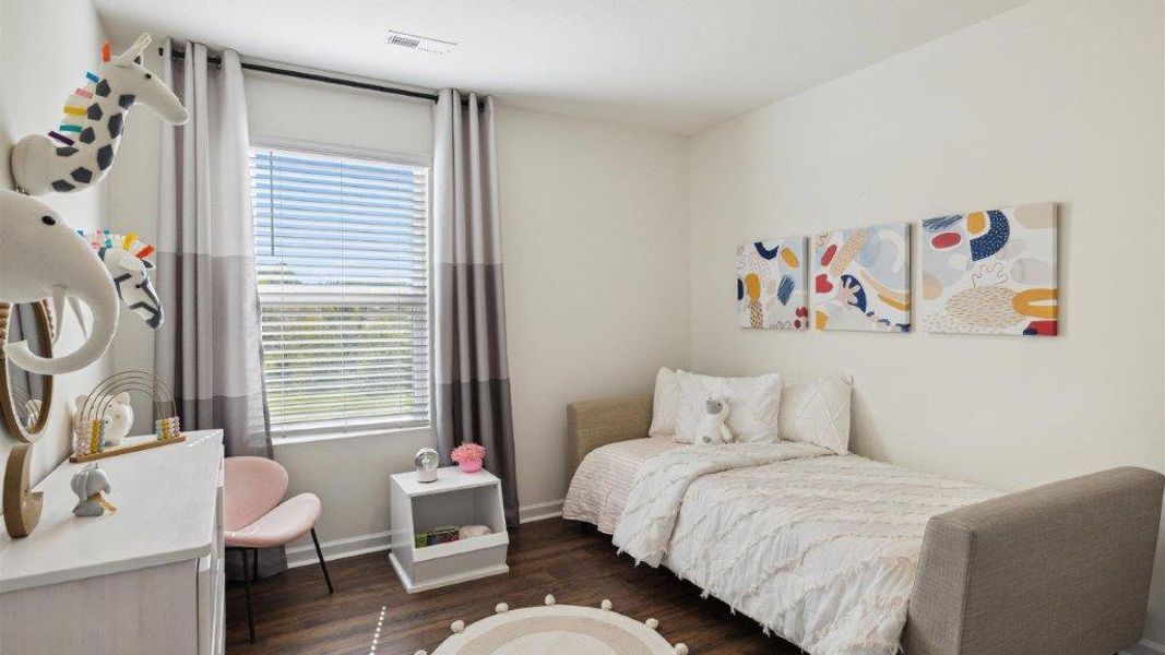 Representative furnished interior of a home built from the Altamont Townhome by D.R. Horton in Belcourt Landing, Cleveland (Image 15).