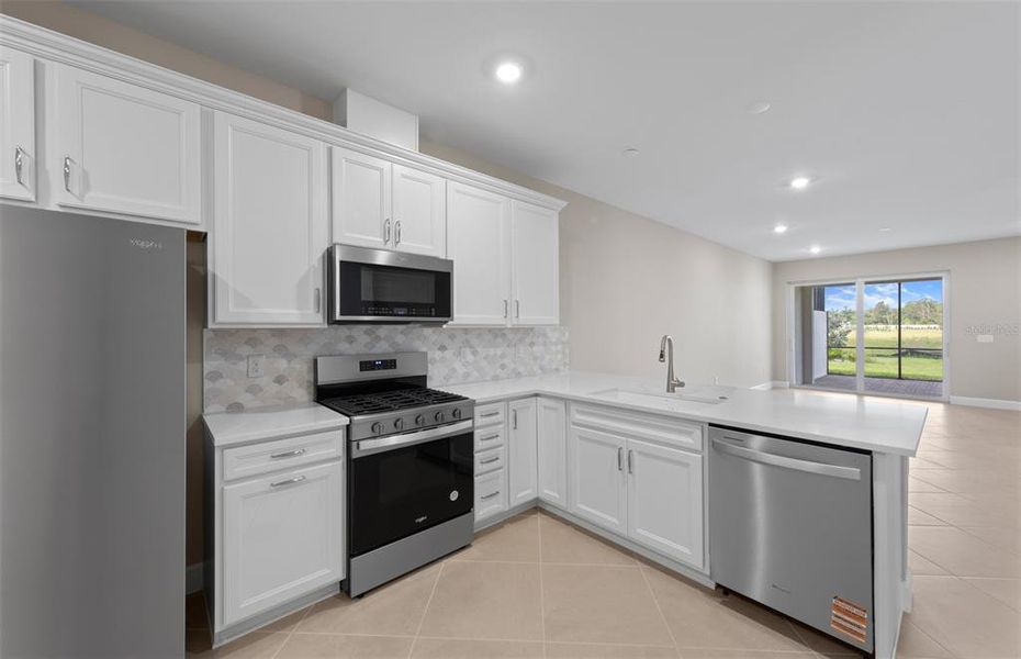 Furnished interior view inside a new home in BeachWalk by Manasota Key, Englewood (Image 11).