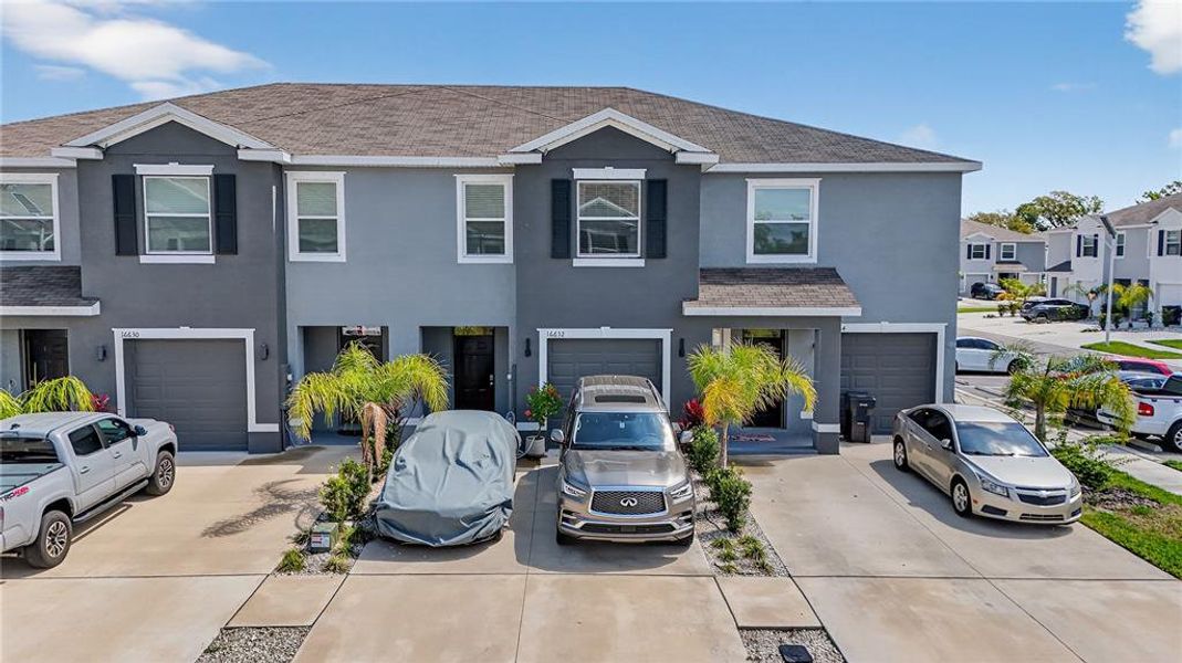 Front exterior of a new home in , Wimauma, FL, highlighting curb appeal (Image 1). Front exterior of a new home in , Wimauma, FL, highlighting curb appeal (Image 1).