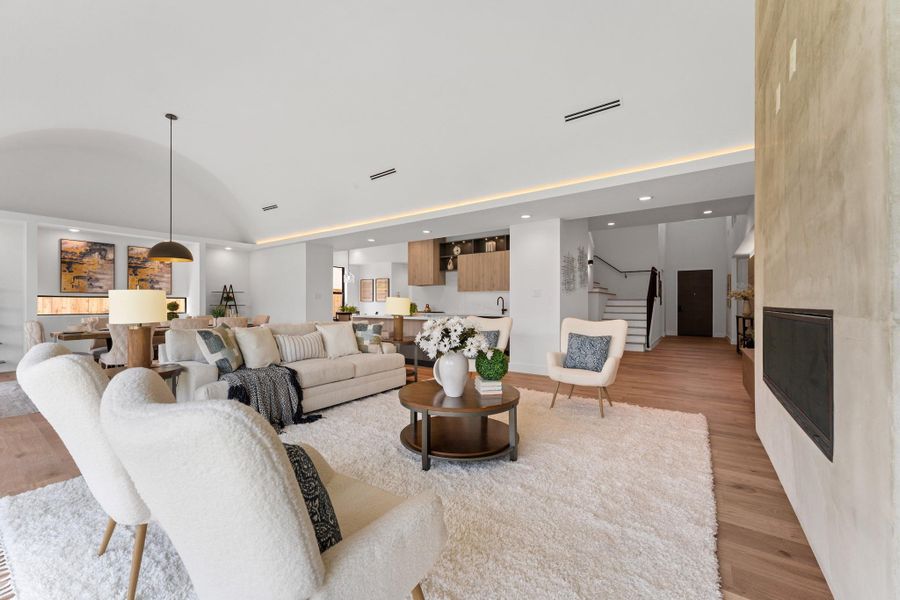 Open-concept flow that feels effortless, framed by architectural lines and finished with rich wood detailing at every turn.