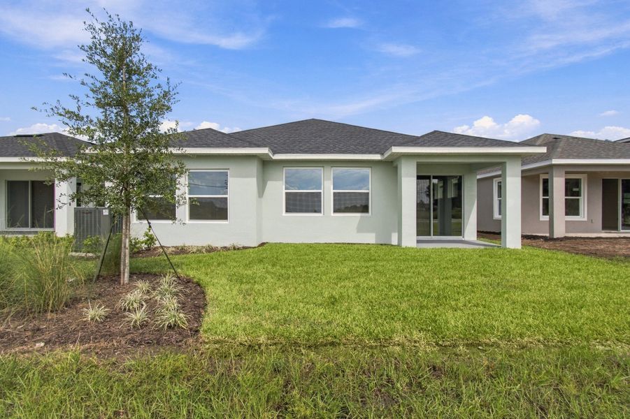 Exterior details and patio area of a home in Lakeside at Satilla, St. Cloud (Image 3).