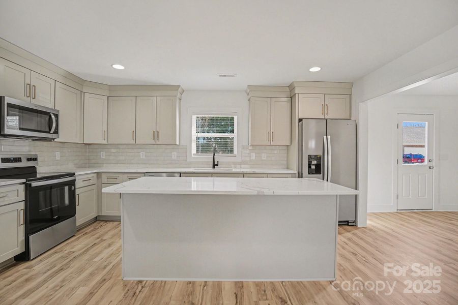 Furnished interior view inside a new home in , Statesville (Image 10).