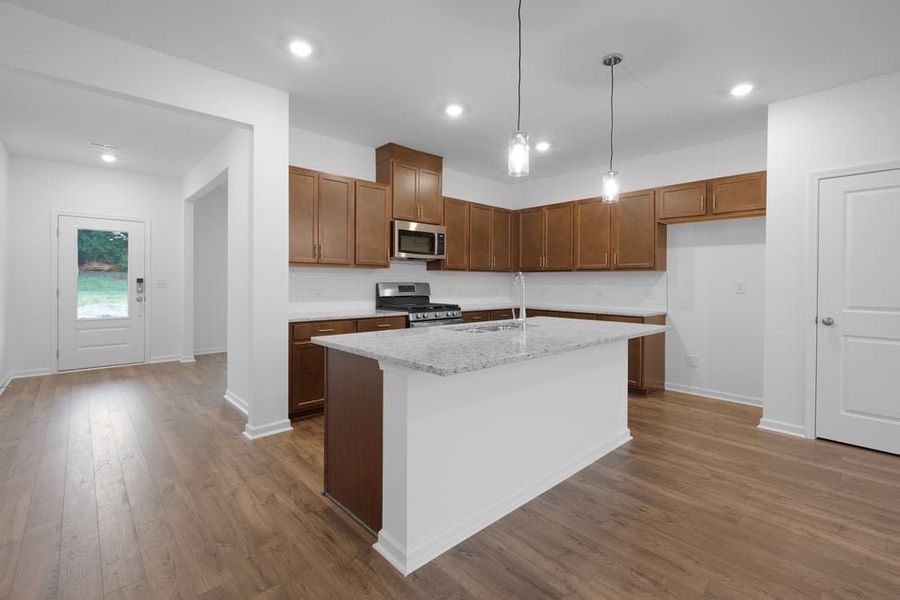Representative furnished interior of a home built from the Norcross by Taylor Morrison in Windance Lake, Loganville (Image 5).