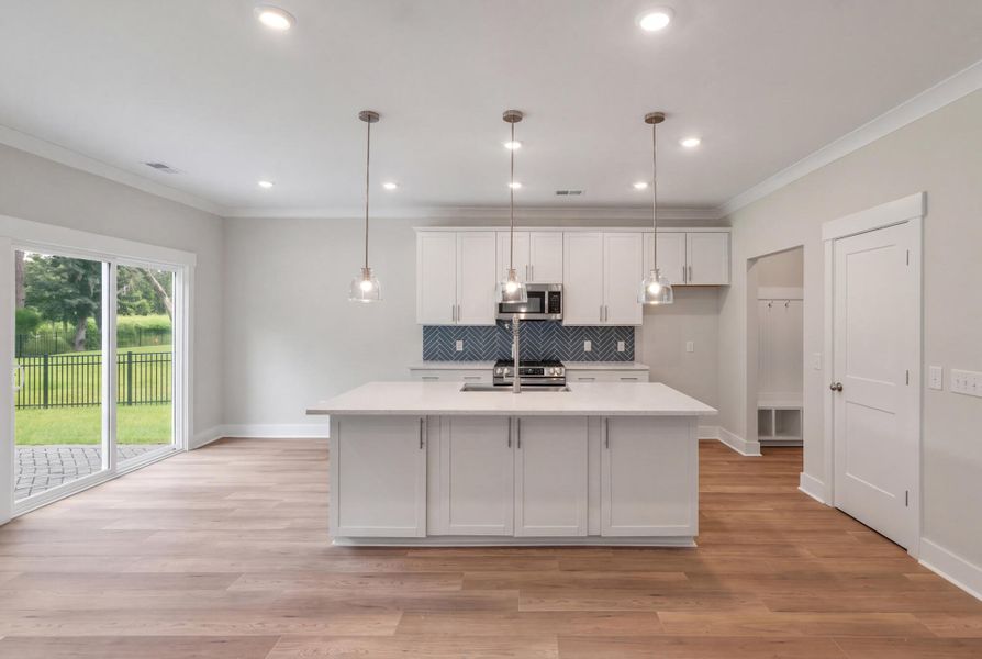 Furnished interior view inside a new home in Academy Park, Beaufort (Image 5).
