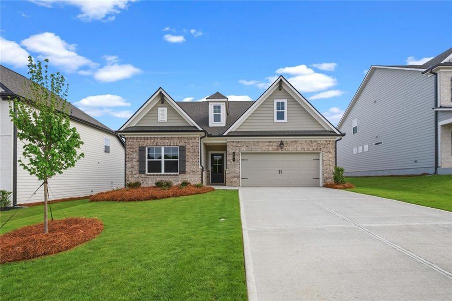 Front exterior of a new home in Summerlin, Winder, GA, highlighting curb appeal (Image 21).
