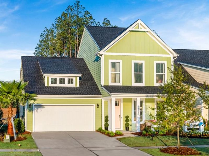 Representative exterior photo of a completed home built from the Devin P by True Homes in Homecoming, Ravenel, SC (Image 1). Representative exterior photo of a completed home built from the Devin P by True Homes in Homecoming, Ravenel, SC (Image 1).