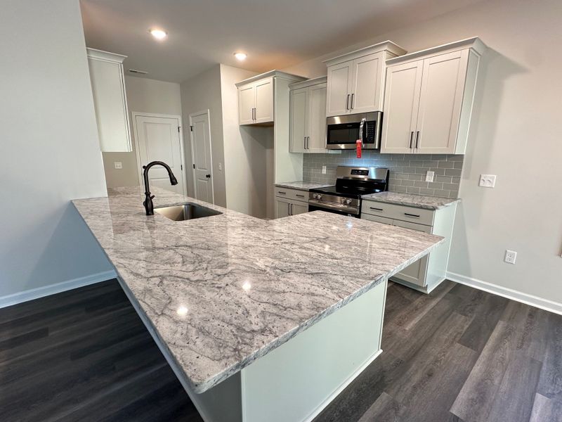 Furnished interior view inside a new home in River Hills, Shallotte (Image 7).