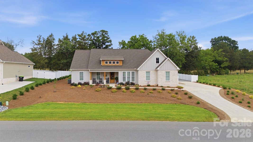 Front exterior of a new home in , Lexington, NC, highlighting curb appeal (Image 23).