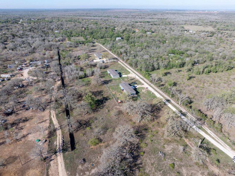 View of property location featuring a heavily wooded area View of property location featuring a heavily wooded area