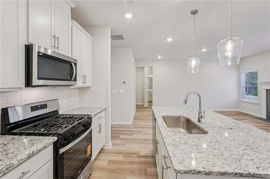 Furnished interior view inside a new home in Harmony Manor, Fairburn (Image 15).