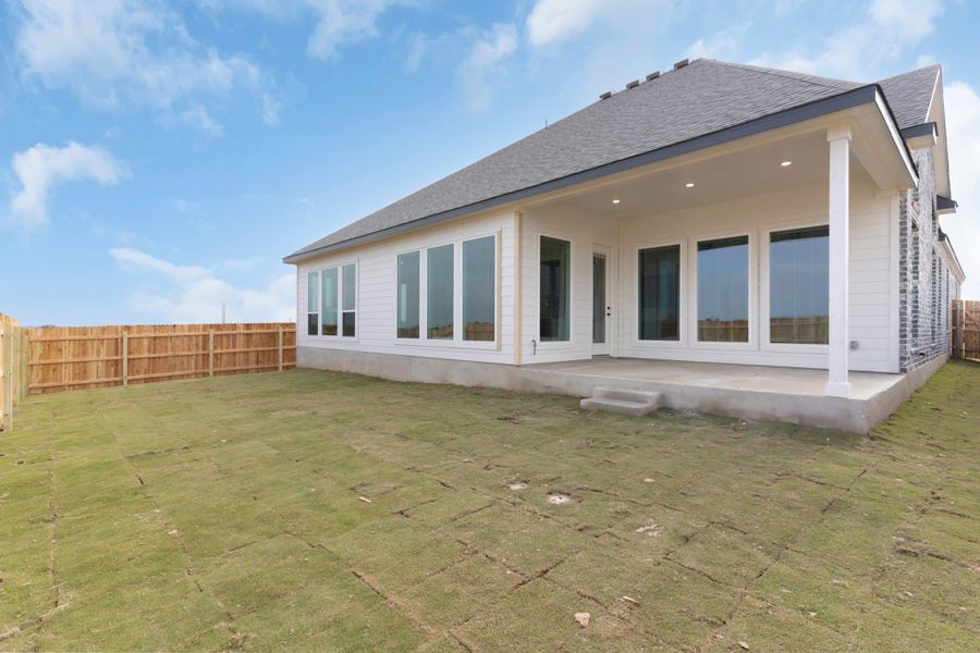 Exterior details and patio area of a home in The Grove at Blackhawk, Pflugerville (Image 4).