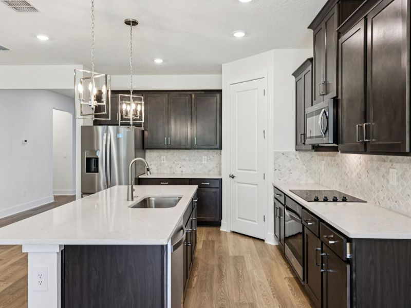 Furnished interior view inside a new home in Ridgehaven - Signature Series, Ormond Beach (Image 5).