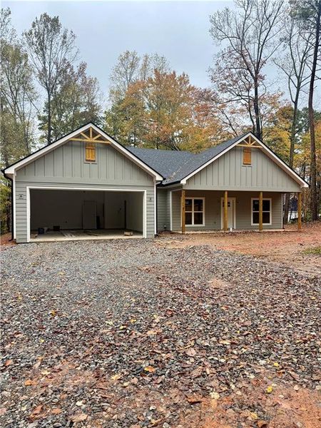 Front exterior of a new home in , Dawsonville, GA, highlighting curb appeal (Image 1).