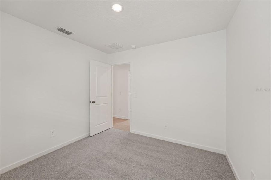 Spacious, unfurnished interior of a new home in Flagler Village - Classic Series, Palm Coast (Image 17). Spacious, unfurnished interior of a new home in Flagler Village - Classic Series, Palm Coast (Image 17).