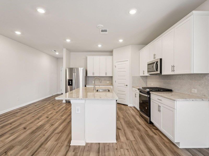 Furnished interior view inside a new home in Riverbend at Double Eagle - Boulevard Collection, Cedar Creek (Image 5). Furnished interior view inside a new home in Riverbend at Double Eagle - Boulevard Collection, Cedar Creek (Image 5).