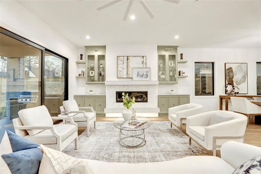 Tremendous sense of space and light Note the 20 foot sliding glass doors, the linear AC vents, outlets installed in the tall baseboards, and contemporary cases on all the windows. The spectacular accent colored interior doors are trimmed with crystal and polished nickel knobs.