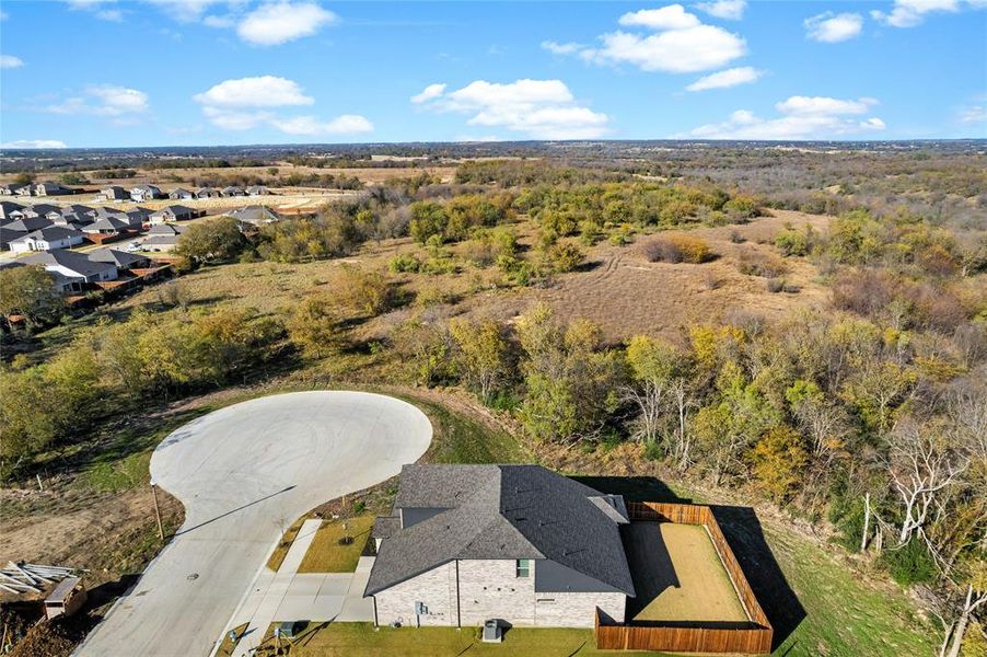Front exterior of a new home in Stark Farms, Denton, TX, highlighting curb appeal (Image 2).